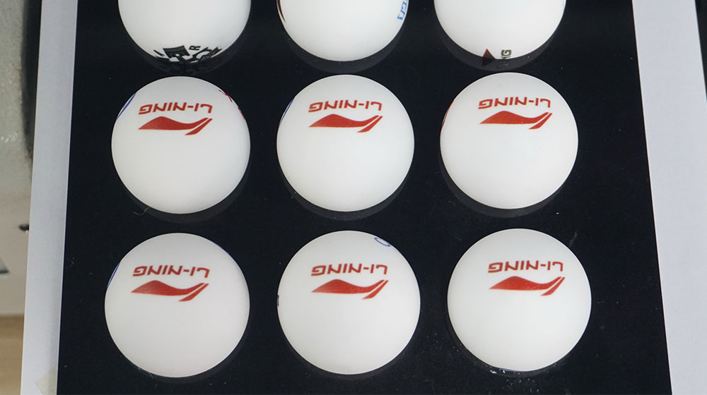 Ping pong ball printer with different logo
