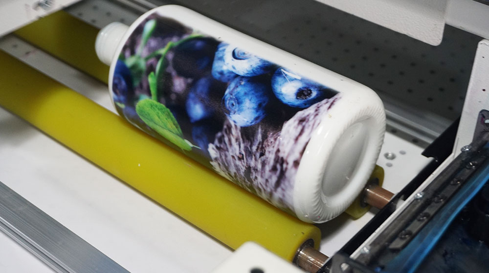 bottle printing with rotary jig